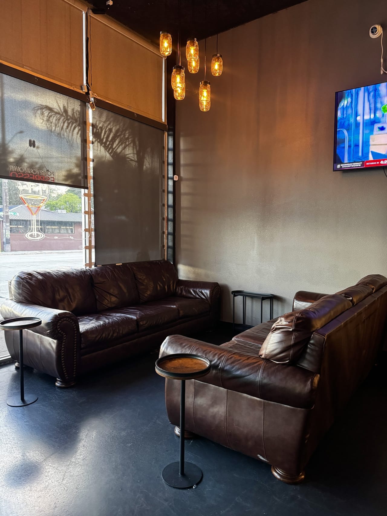 Leather lounge sofas and pendant lights at Pour Choice Taphouse in Mills 50 Orlando